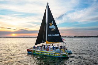Sunset Dolphin Sail Aboard the Privateer Catamaran