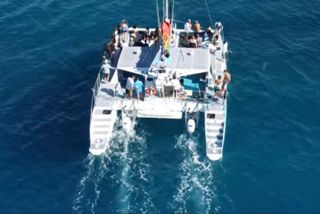 Board from Waikiki Beach for Aloha Hour Sail on Hāwea Catamaran
